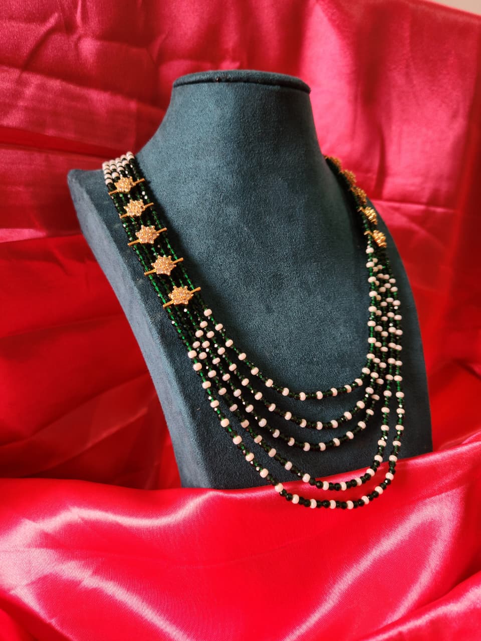 Green cz beads with with sugar beads with star flower pendants