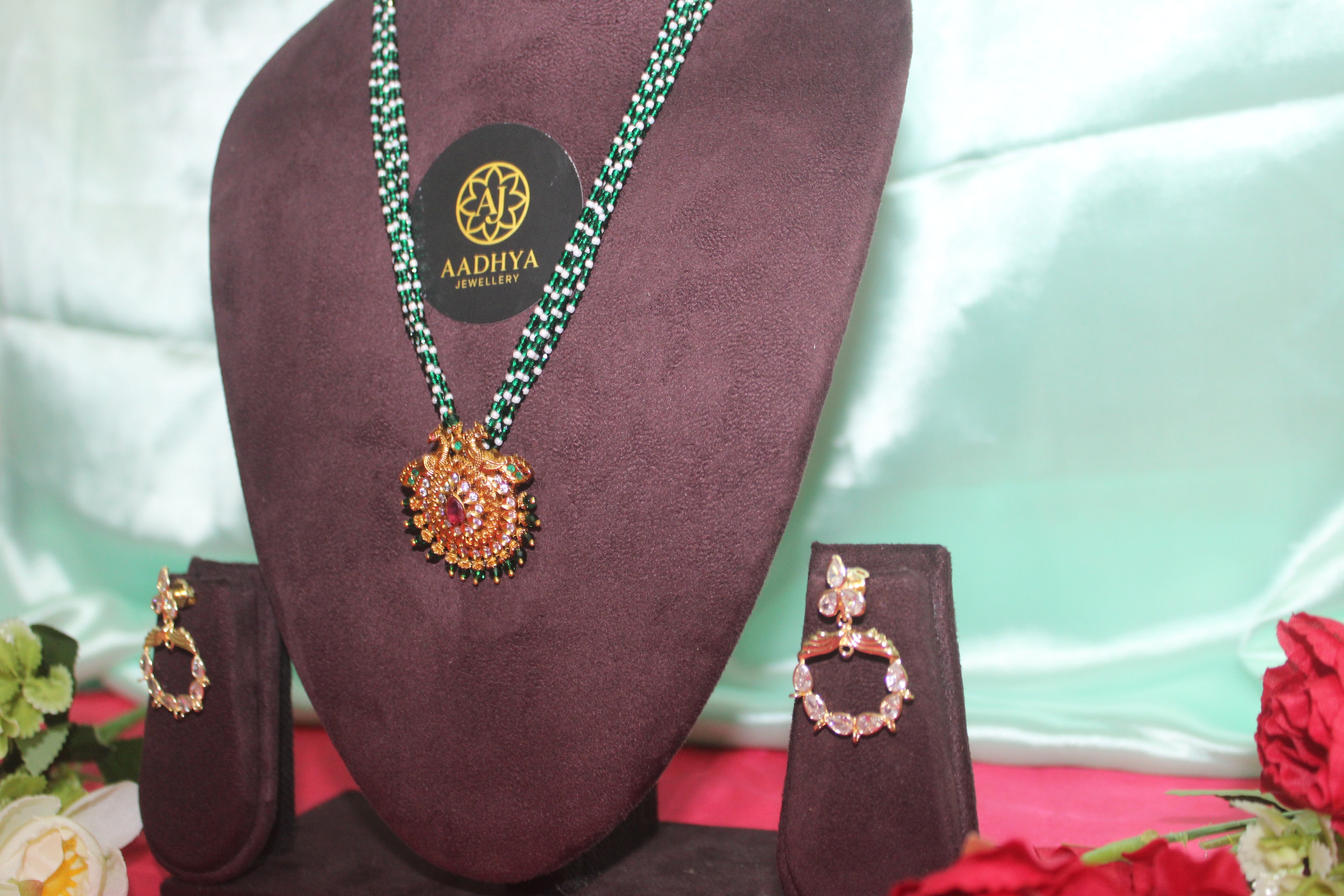 green crystal beads with sugar beads ,peacock pendent matching earings