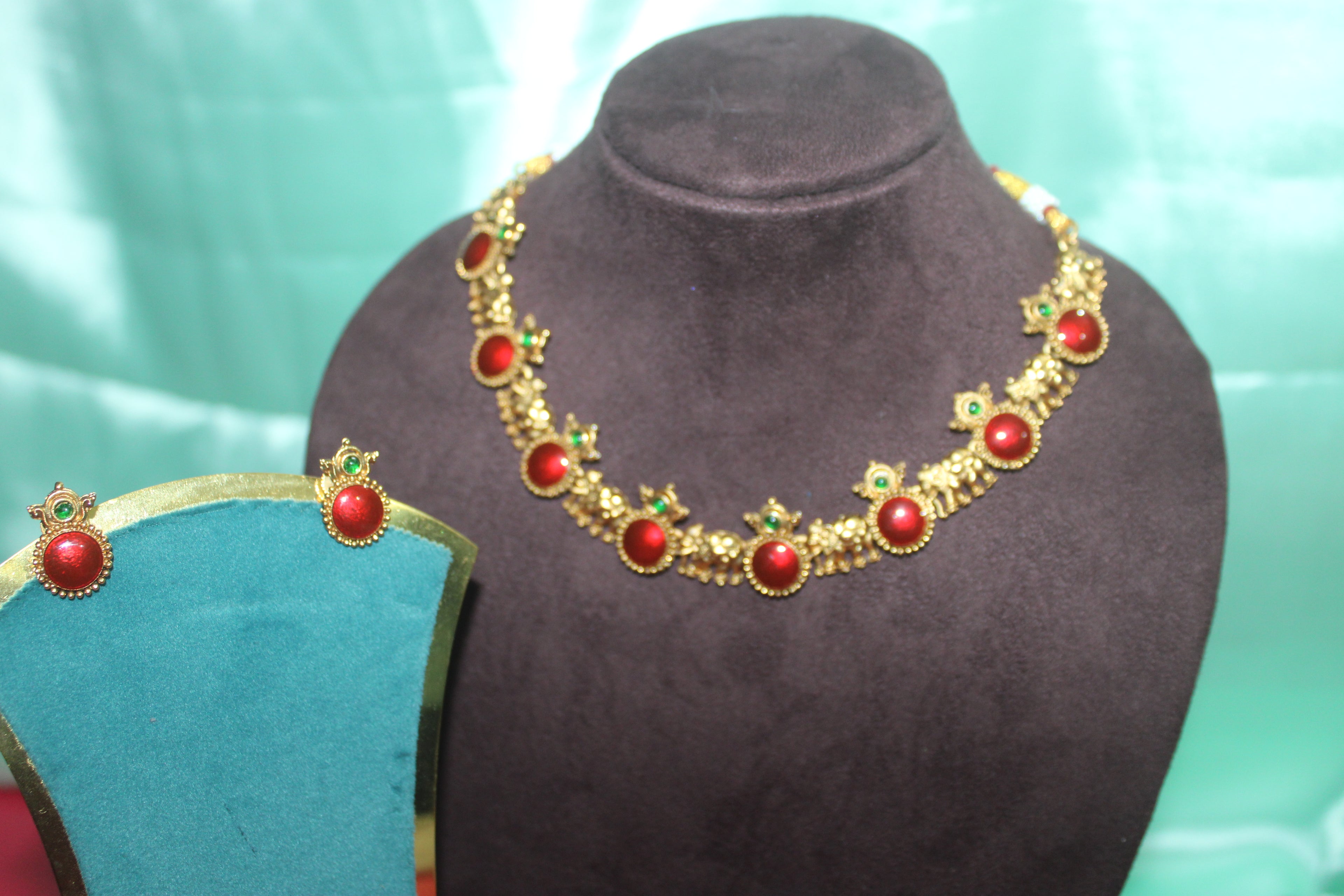 Elephant model green and red stones neck set with earings