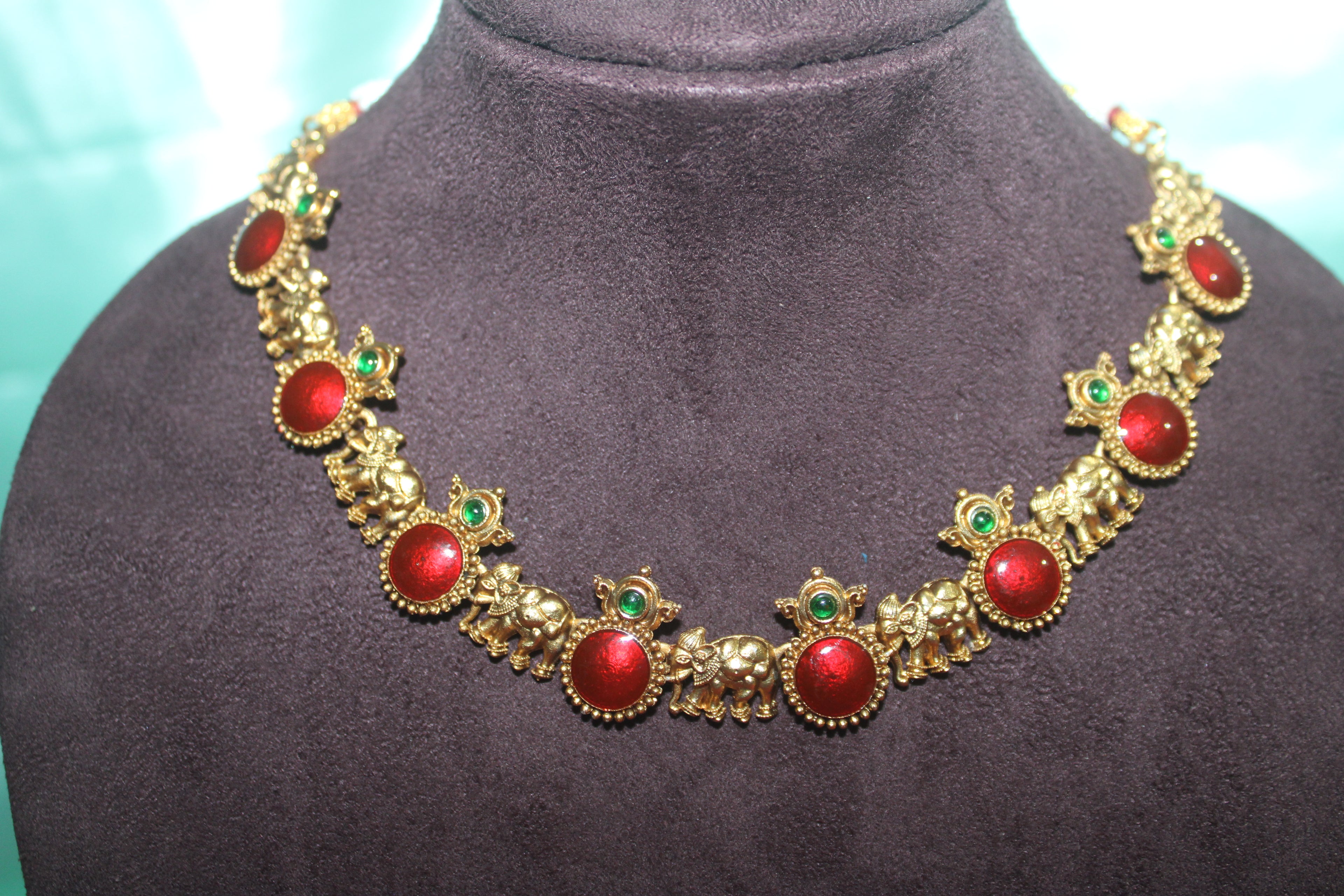 Elephant model green and red stones neck set with earings