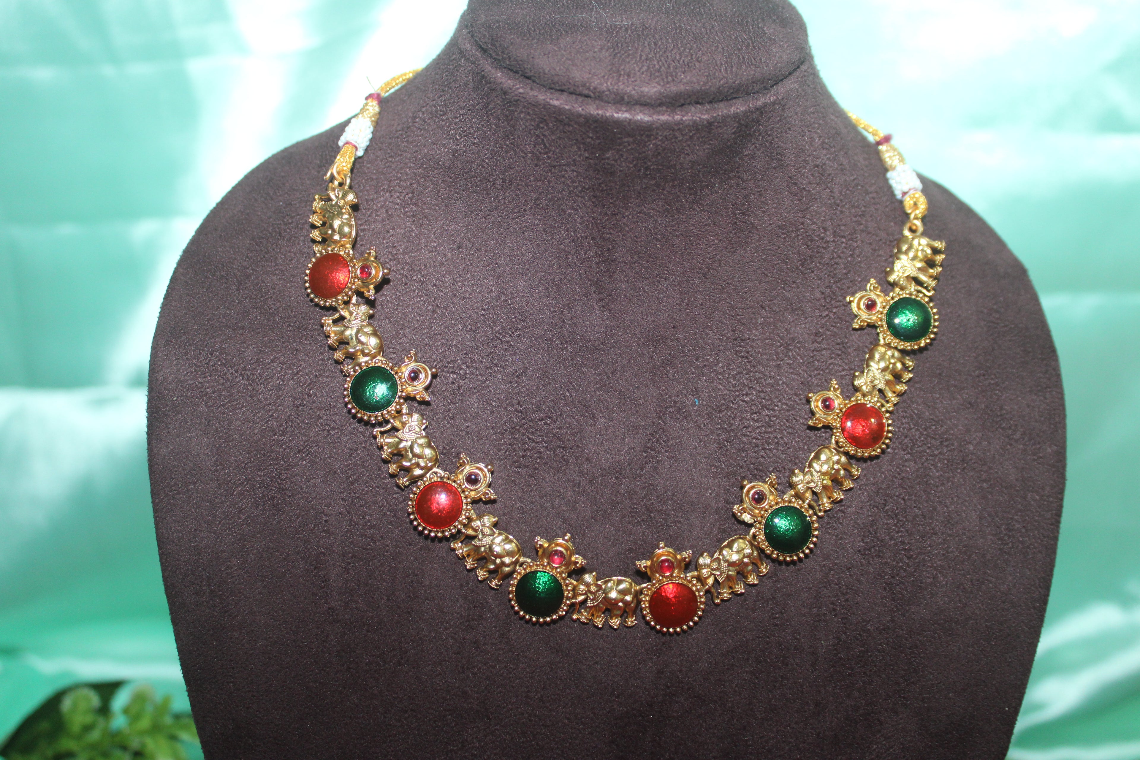 Elephant model with multi colour stones with earings