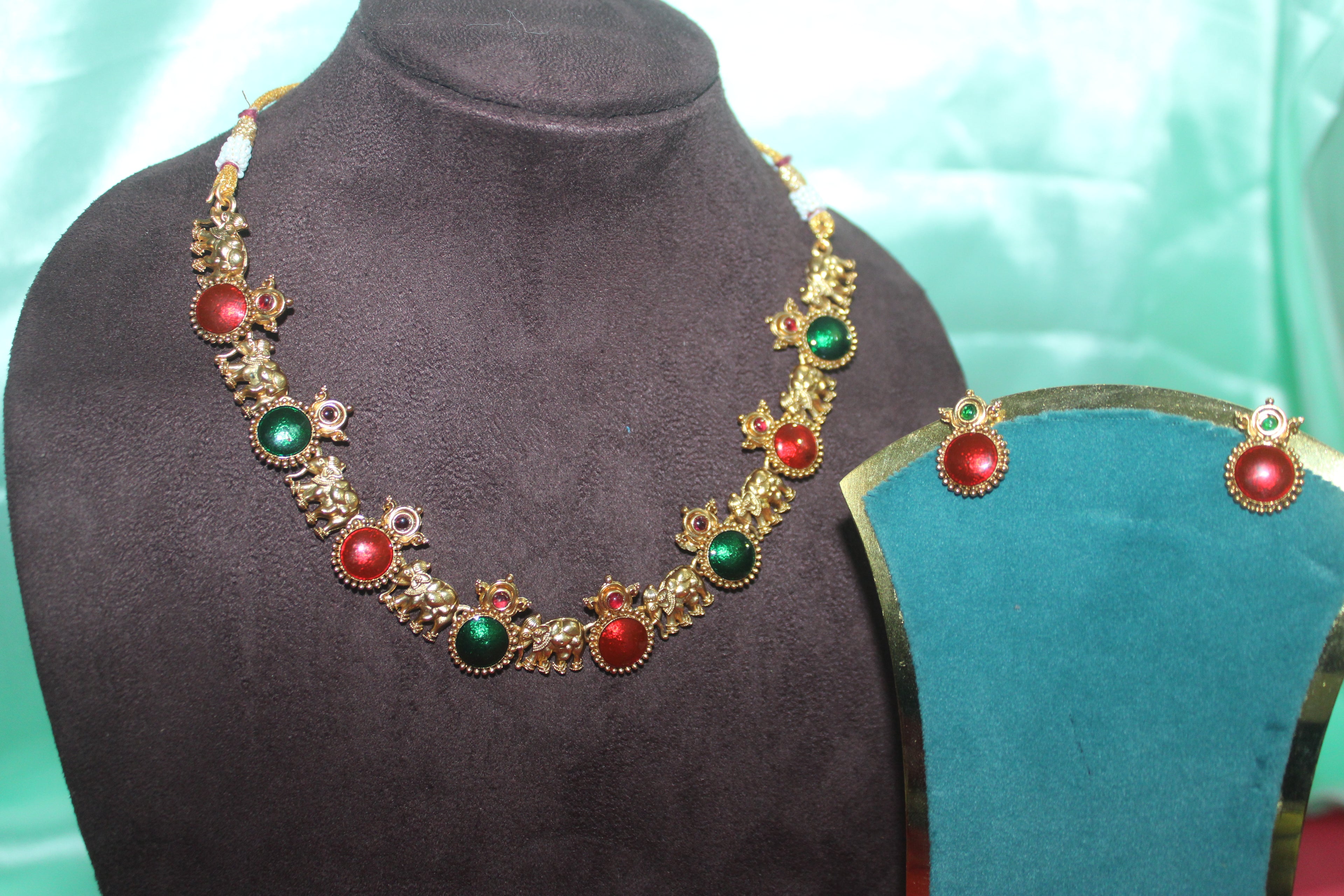 Elephant model with multi colour stones with earings