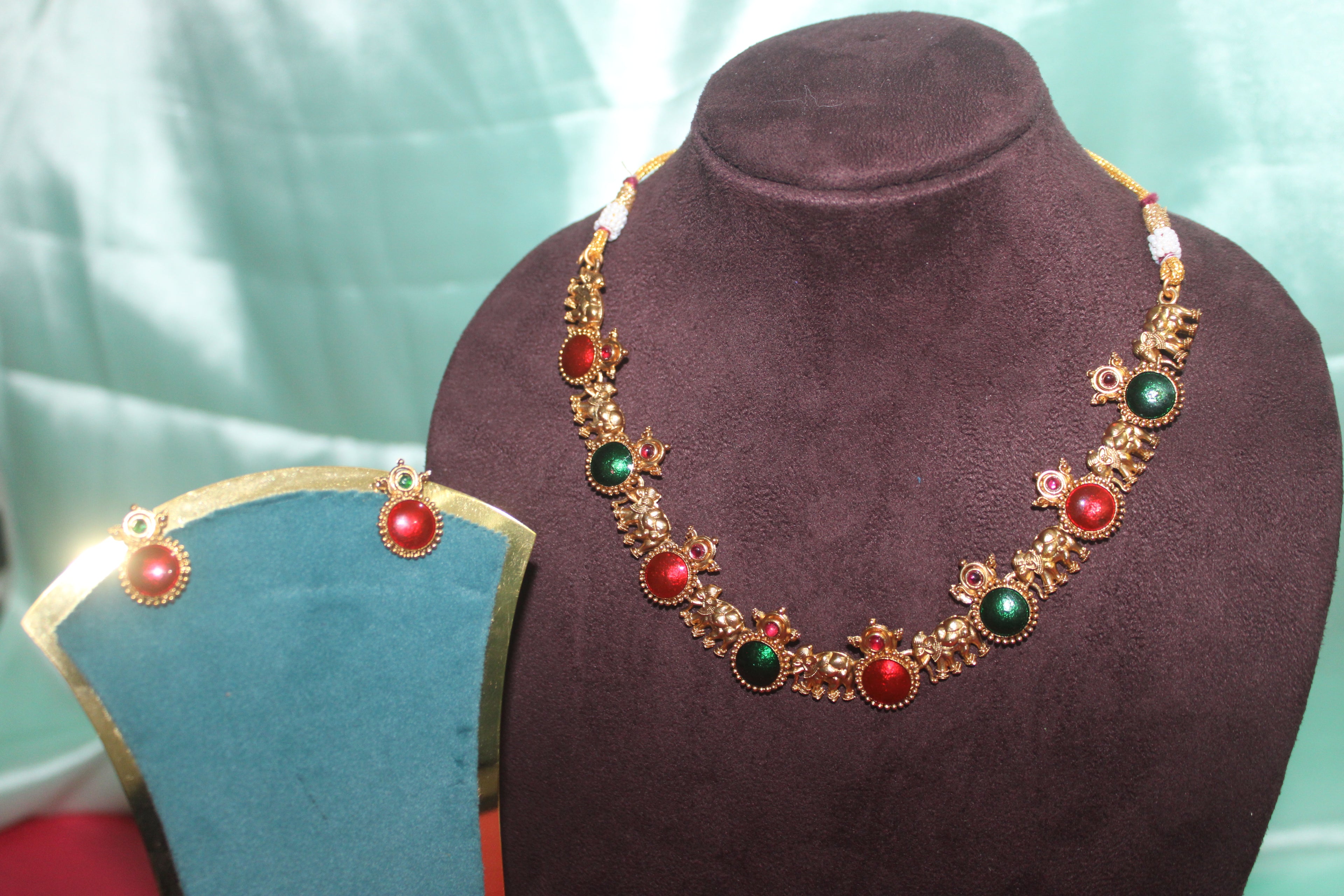 Elephant model with multi colour stones with earings