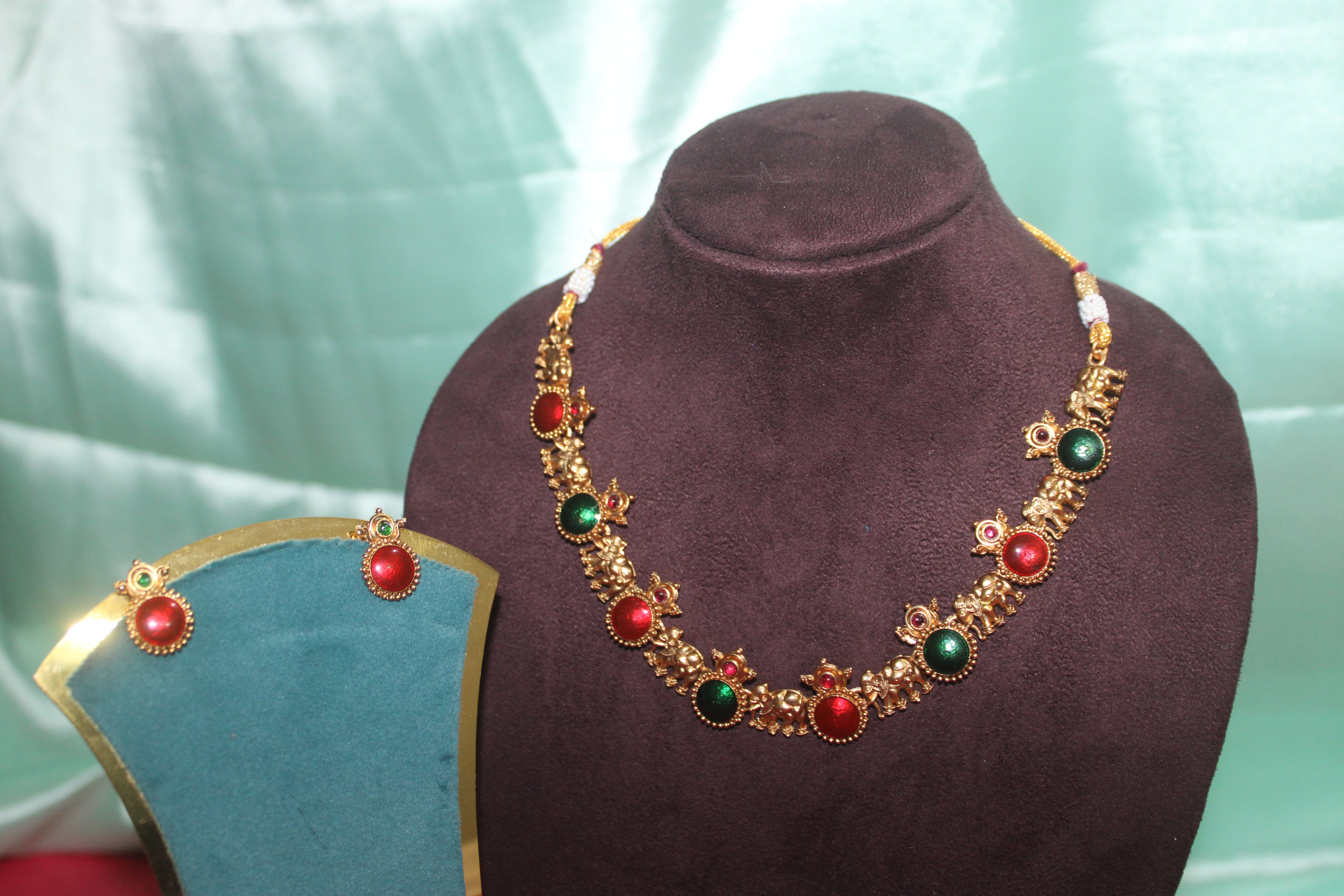 Elephant model with multi colour stones with earings