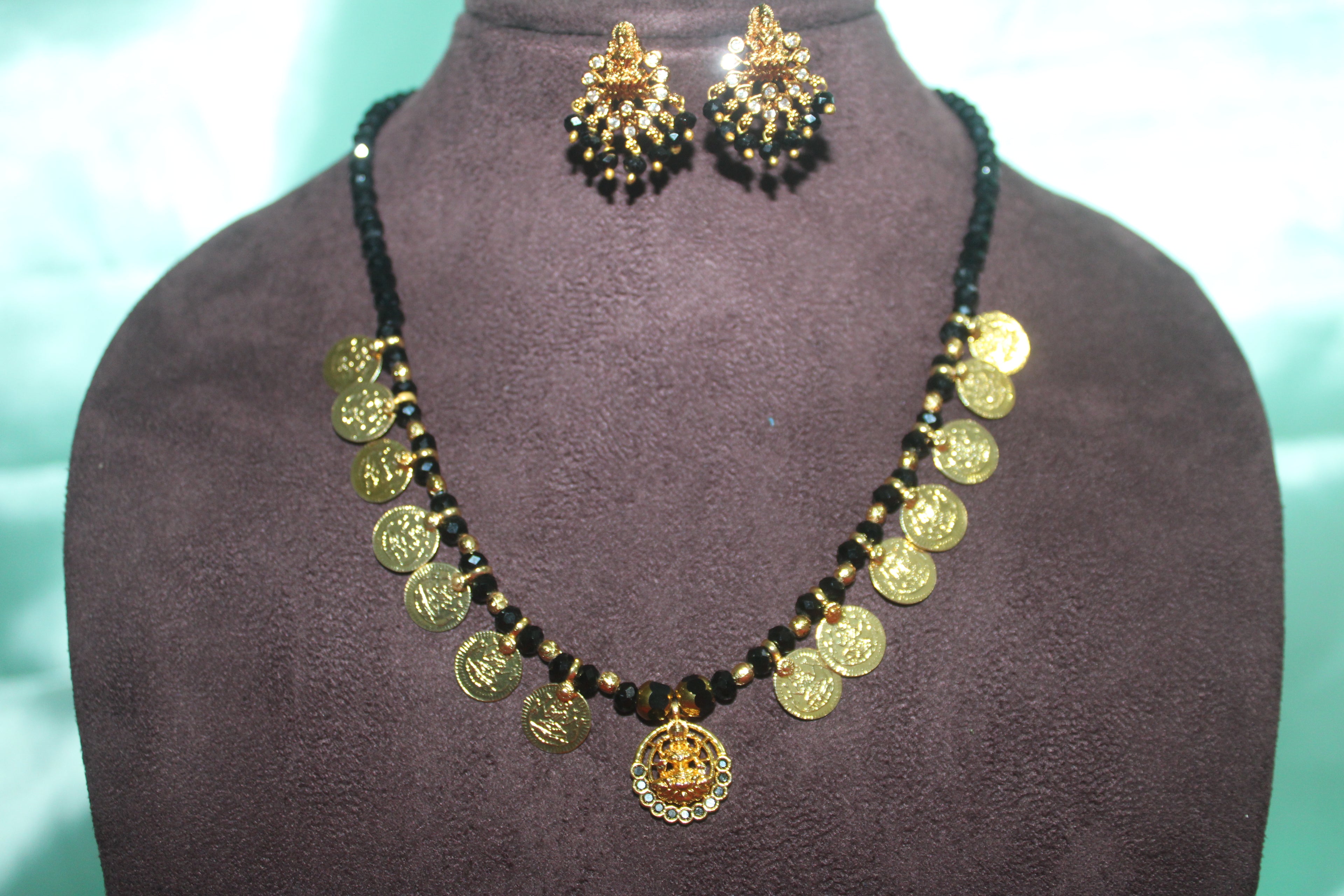 Lord laxmi kasula peru  Short with black crystal beads &earings
