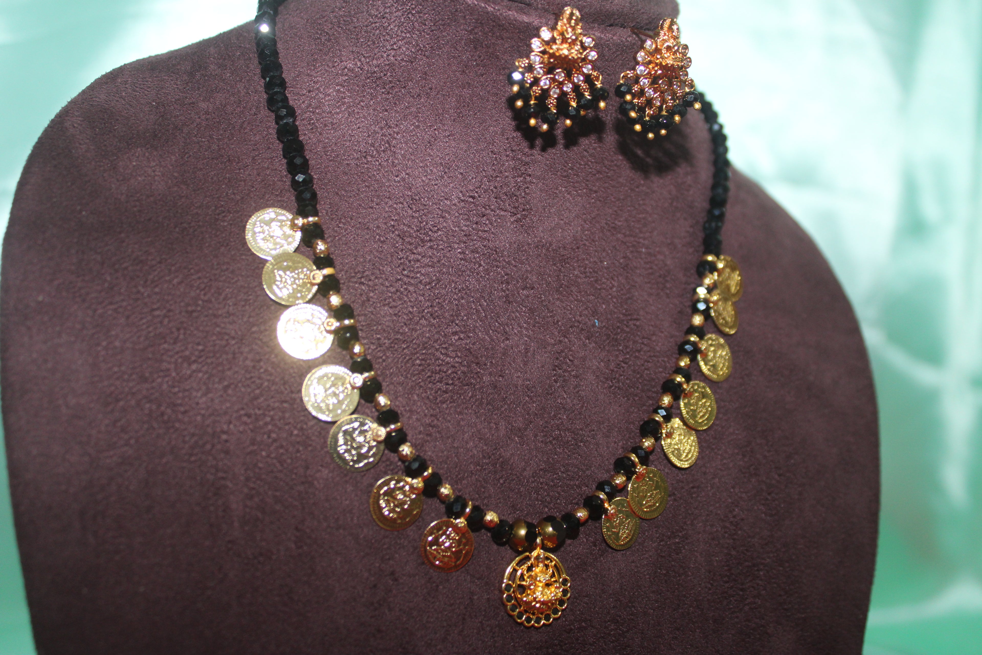 Lord laxmi kasula peru  Short with black crystal beads &earings