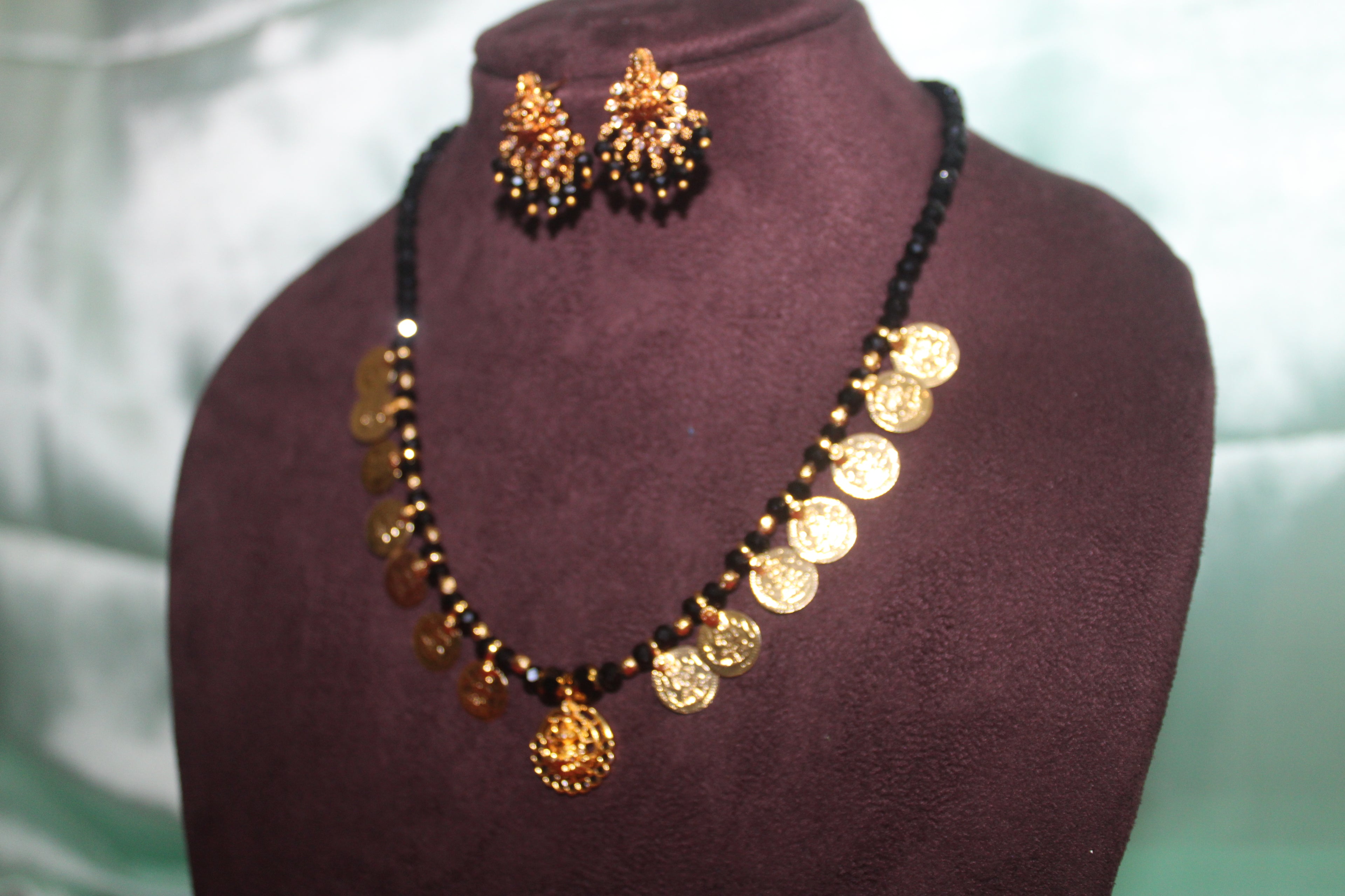 Lord laxmi kasula peru  Short with black crystal beads &earings