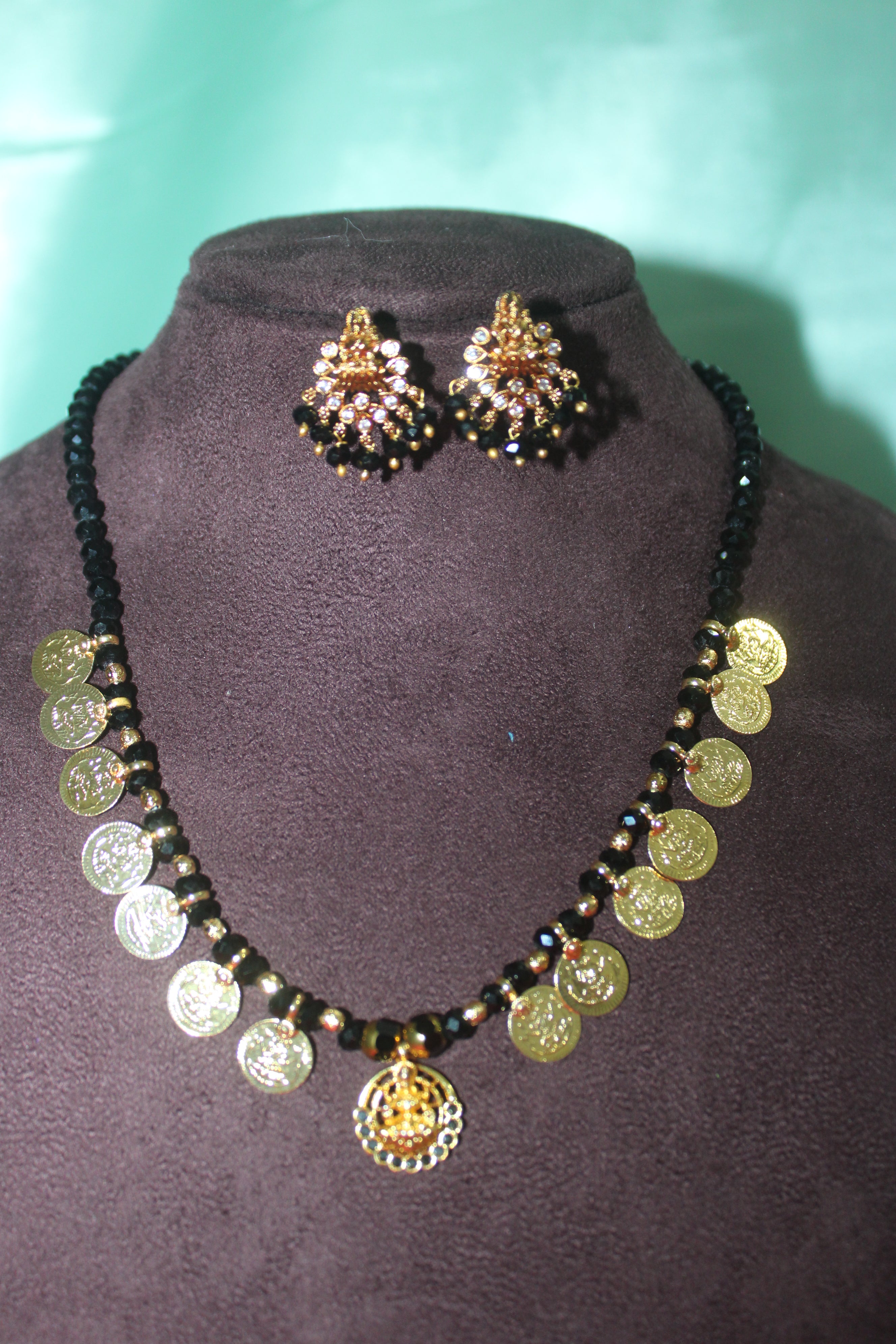Lord laxmi kasula peru  Short with black crystal beads &earings