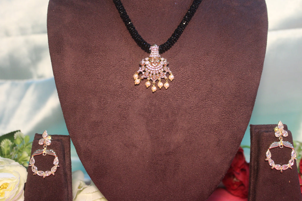 Black beads cz mala with lord venkateshwara diamonds embedded in it with matching earings