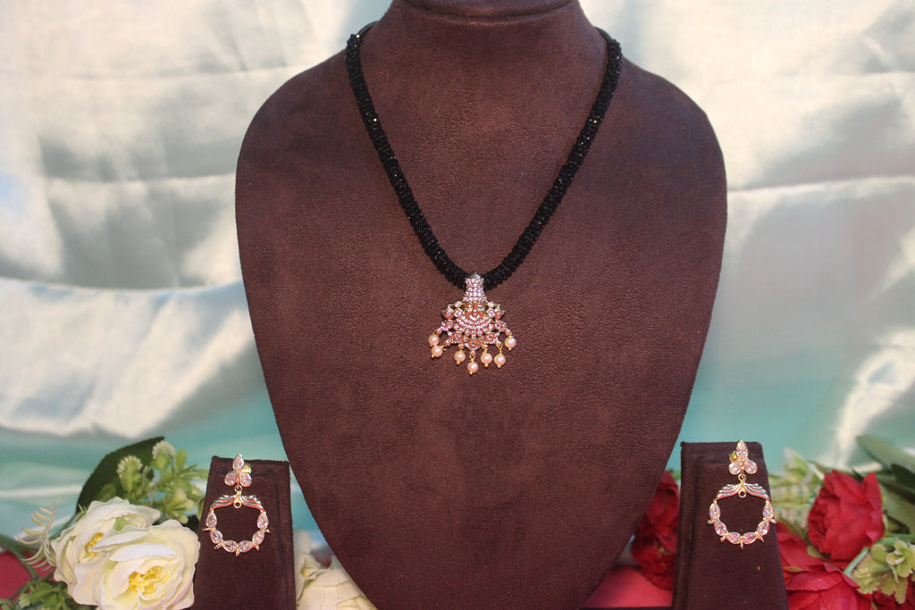 Black beads cz mala with lord venkateshwara diamonds embedded in it with matching earings
