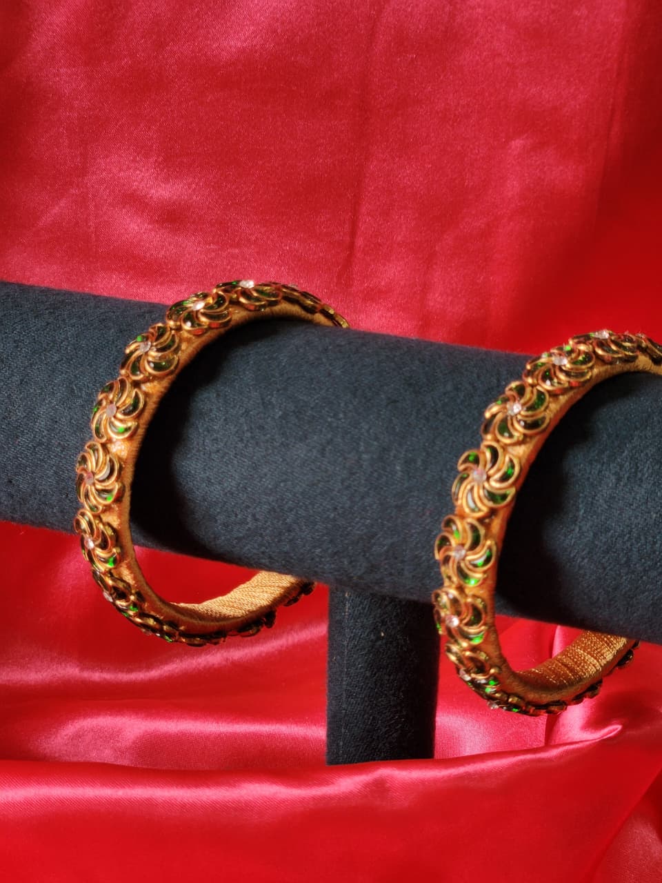 Thread bangles with vibrant green beads