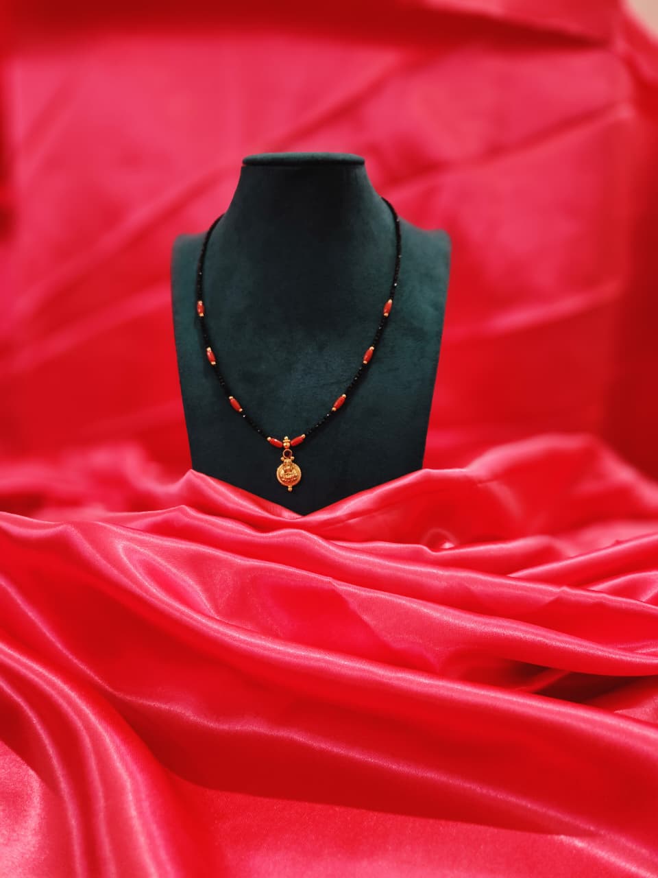 Black and marron beads with Laxmi locket mangal sutra for office wear
