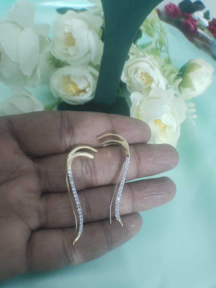 Premium quality Bugatti for ears with american diamonds embedded in to unique shape